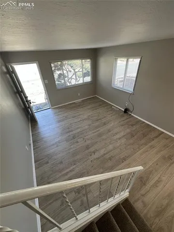 a view of an empty room and window