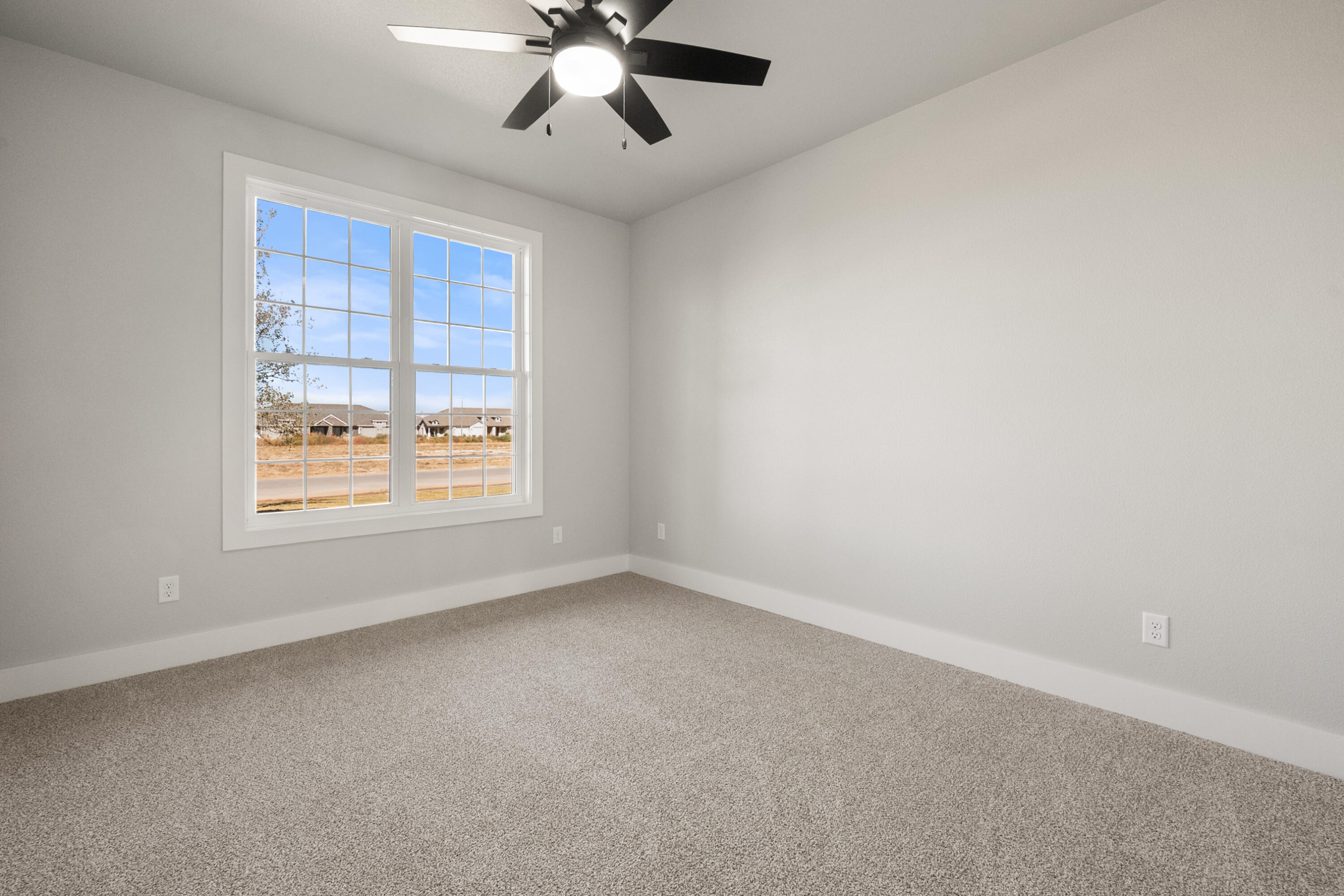 1119 North 6th Street Wolfforth, TX 79382 - Photo 26 of 37 a view of an empty room with a window