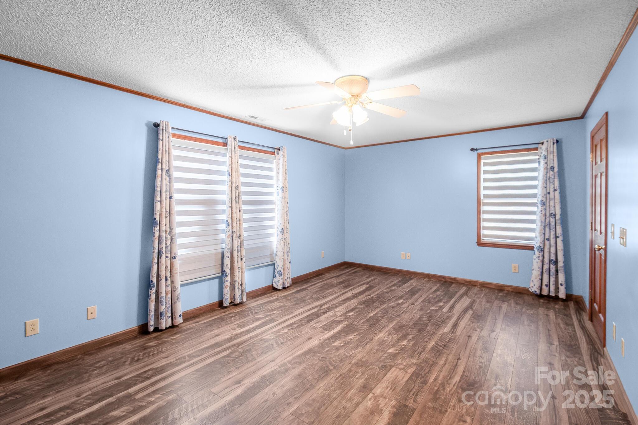 1295 Cattle Ridge Road Cheraw, SC 29520 - Photo 15 of 24 wooden floor in an empty room with a window