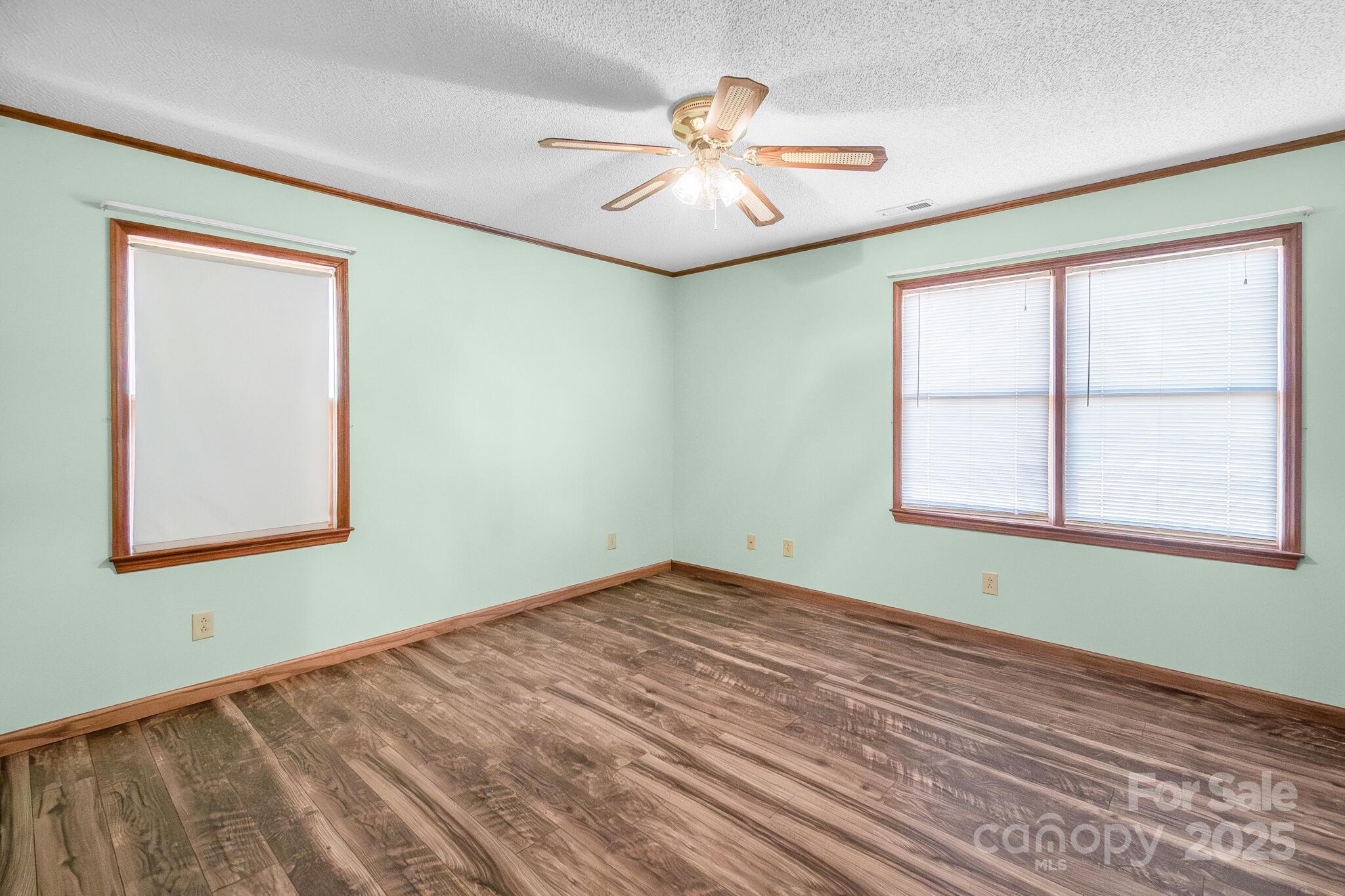 1295 Cattle Ridge Road Cheraw, SC 29520 - Photo 20 of 24 a view of an empty room with window and chandelier fan