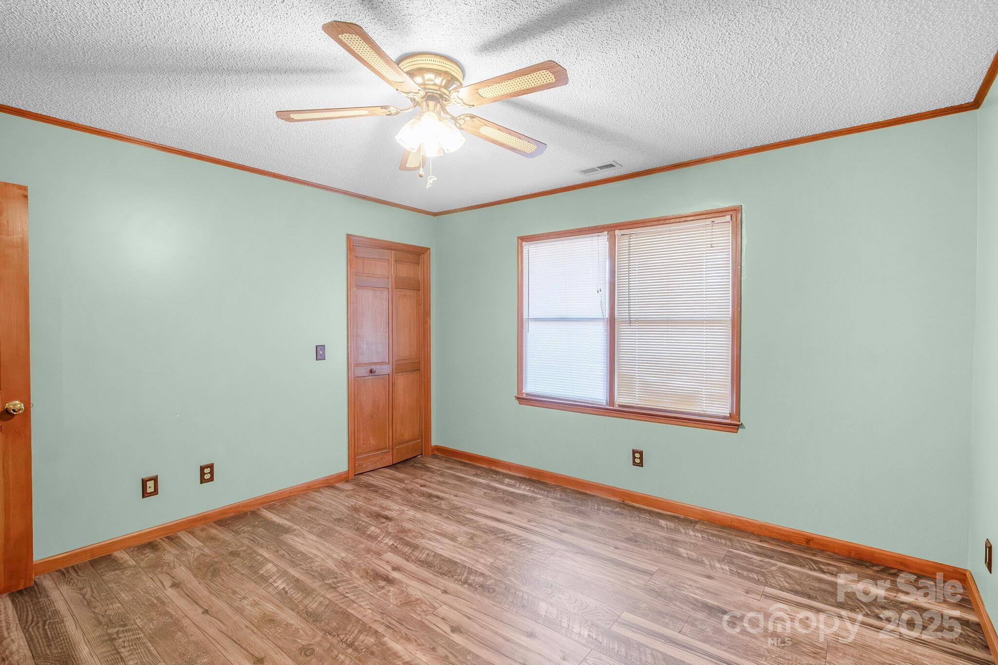 1295 Cattle Ridge Road Cheraw, SC 29520 - Photo 21 of 24 a view of an empty room with a window