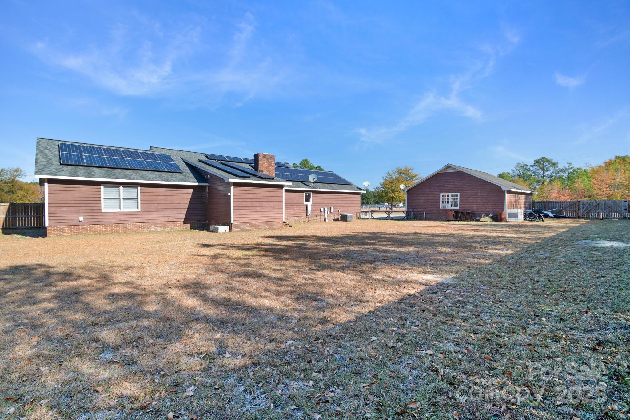 1295 Cattle Ridge Road Cheraw, SC 29520 - Photo 5 of 24 a house view with a backyard space