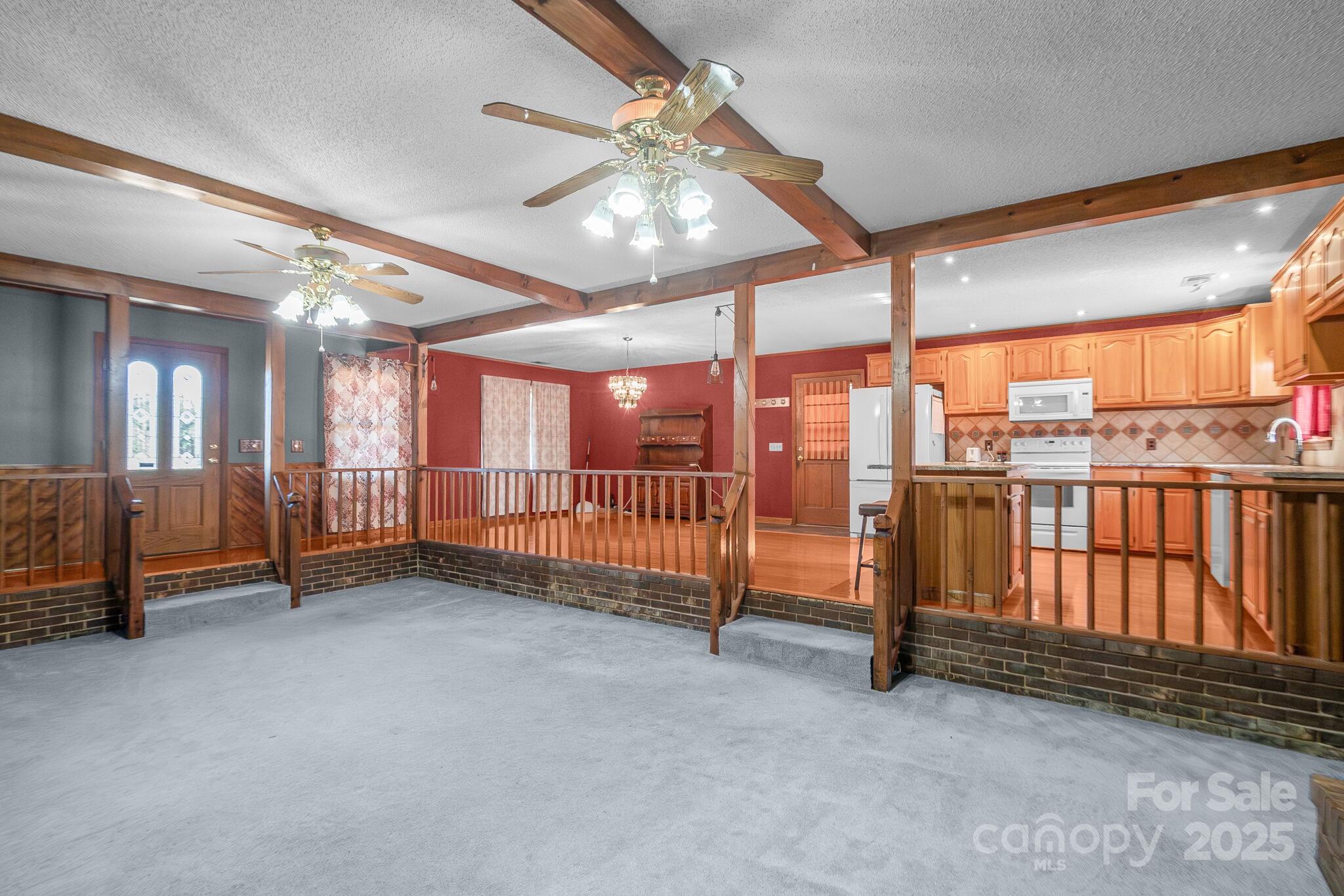 1295 Cattle Ridge Road Cheraw, SC 29520 - Photo 6 of 24 a view of an empty room with a balcony