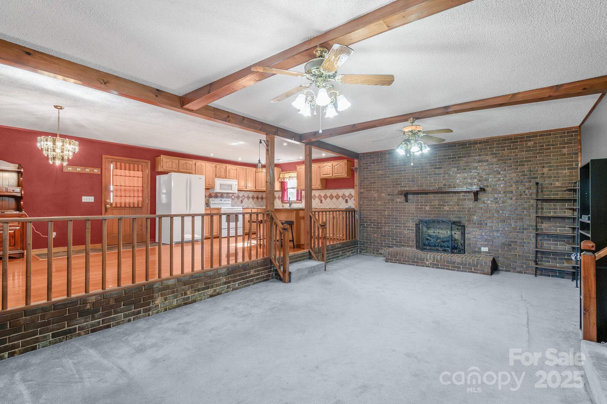 1295 Cattle Ridge Road Cheraw, SC 29520 - Photo 7 of 24 a view of a livingroom with a fireplace