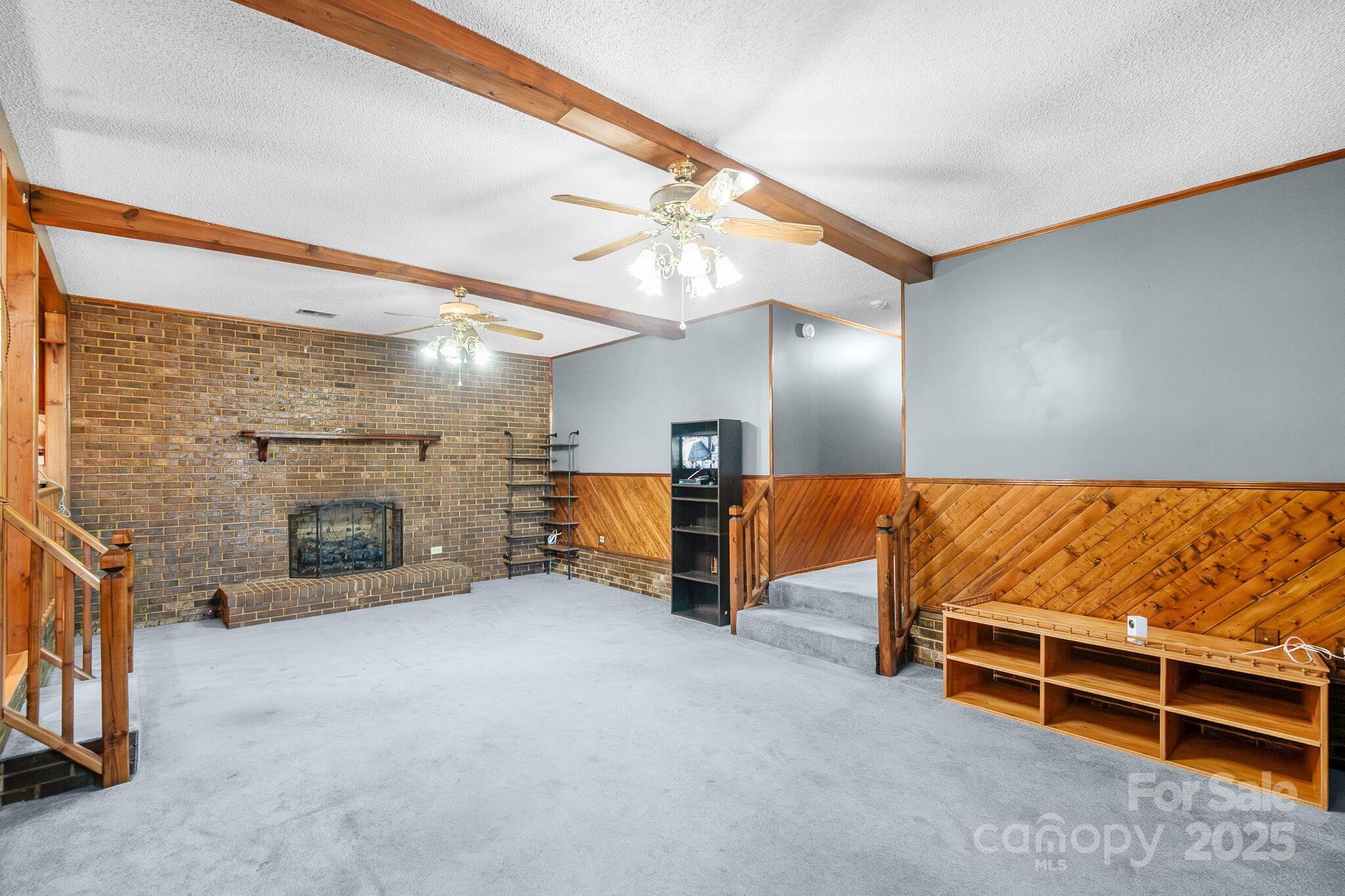1295 Cattle Ridge Road Cheraw, SC 29520 - Photo 8 of 24 a view of a livingroom with furniture and a fireplace