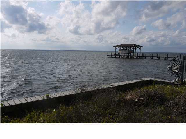Lot 5 Driftwood Point Road Miramar Beach, FL 32550 - Photo 3 of 9 a black and white photo of a house