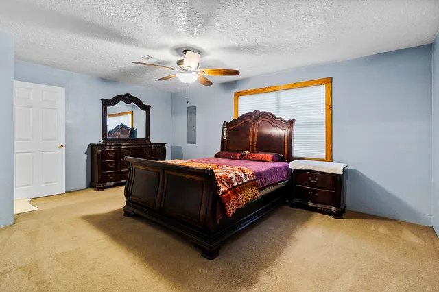 a view of a roof deck with wooden fence