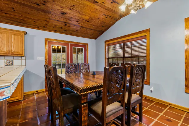 a bathroom with a sink a mirror and bathtub