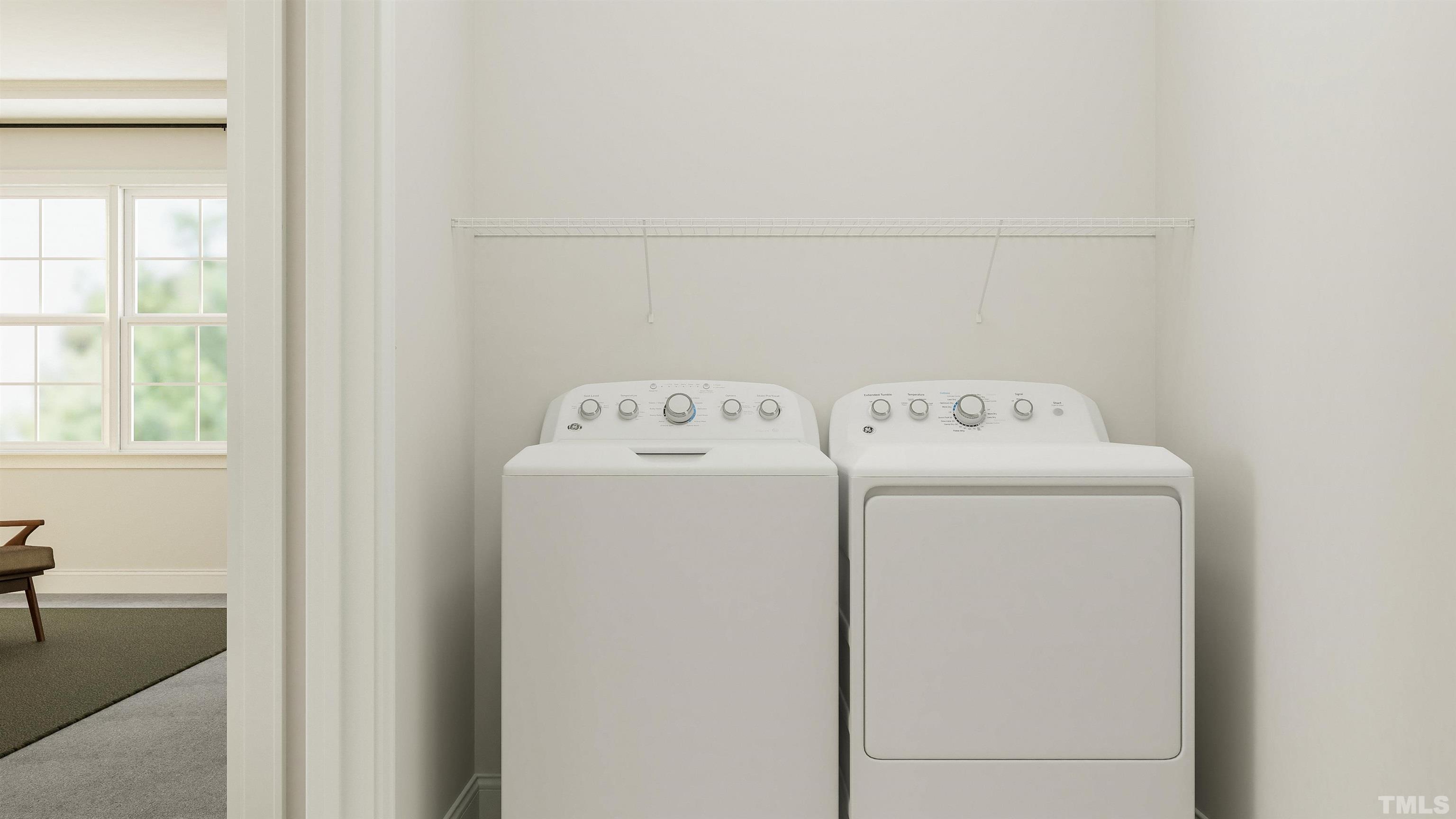 109 Calvander Lane Apex, NC 27539 - Photo 21 of 36 a utility room with dryer and washer