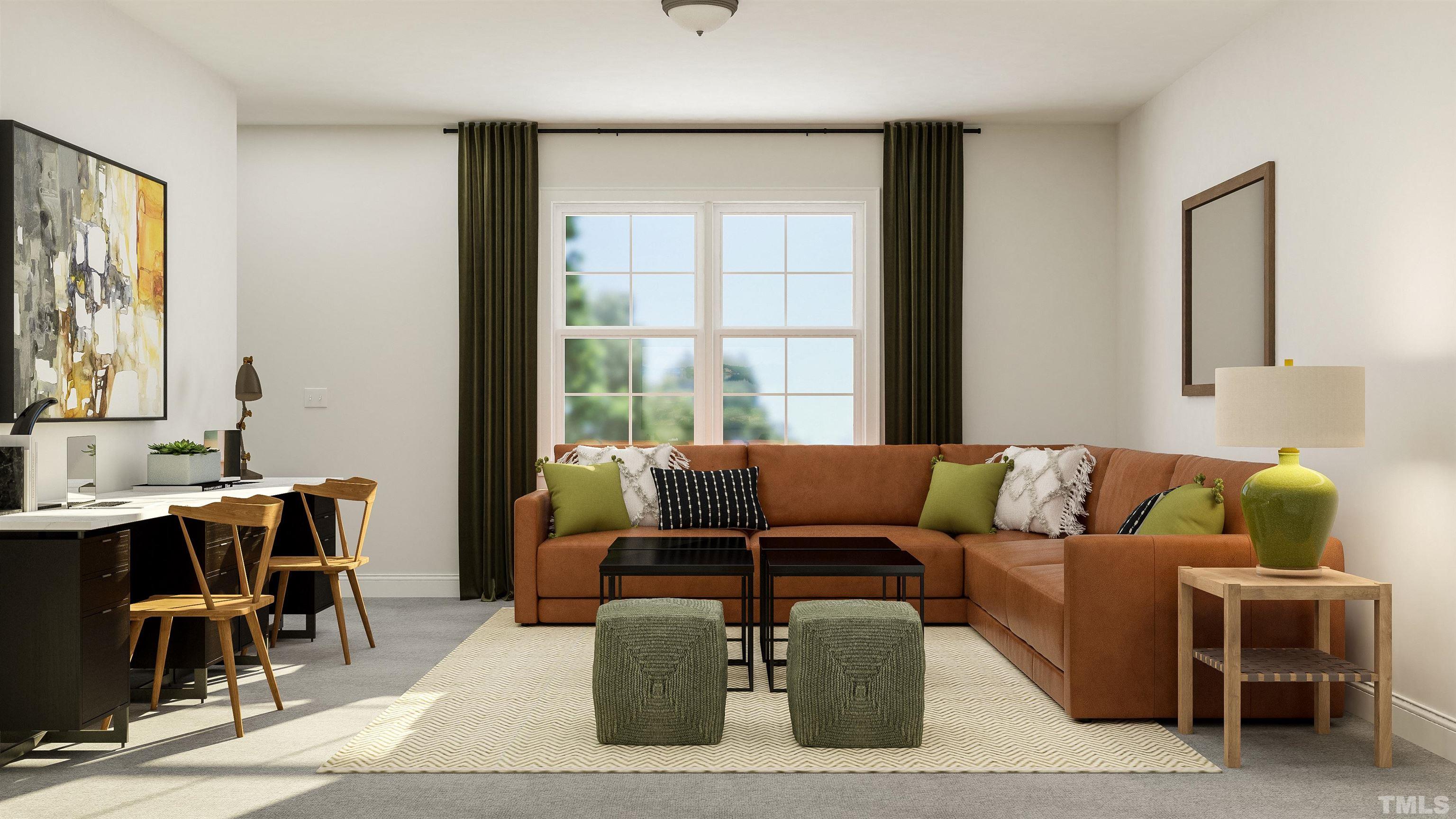 109 Calvander Lane Apex, NC 27539 - Photo 23 of 36 a living room with furniture and a window