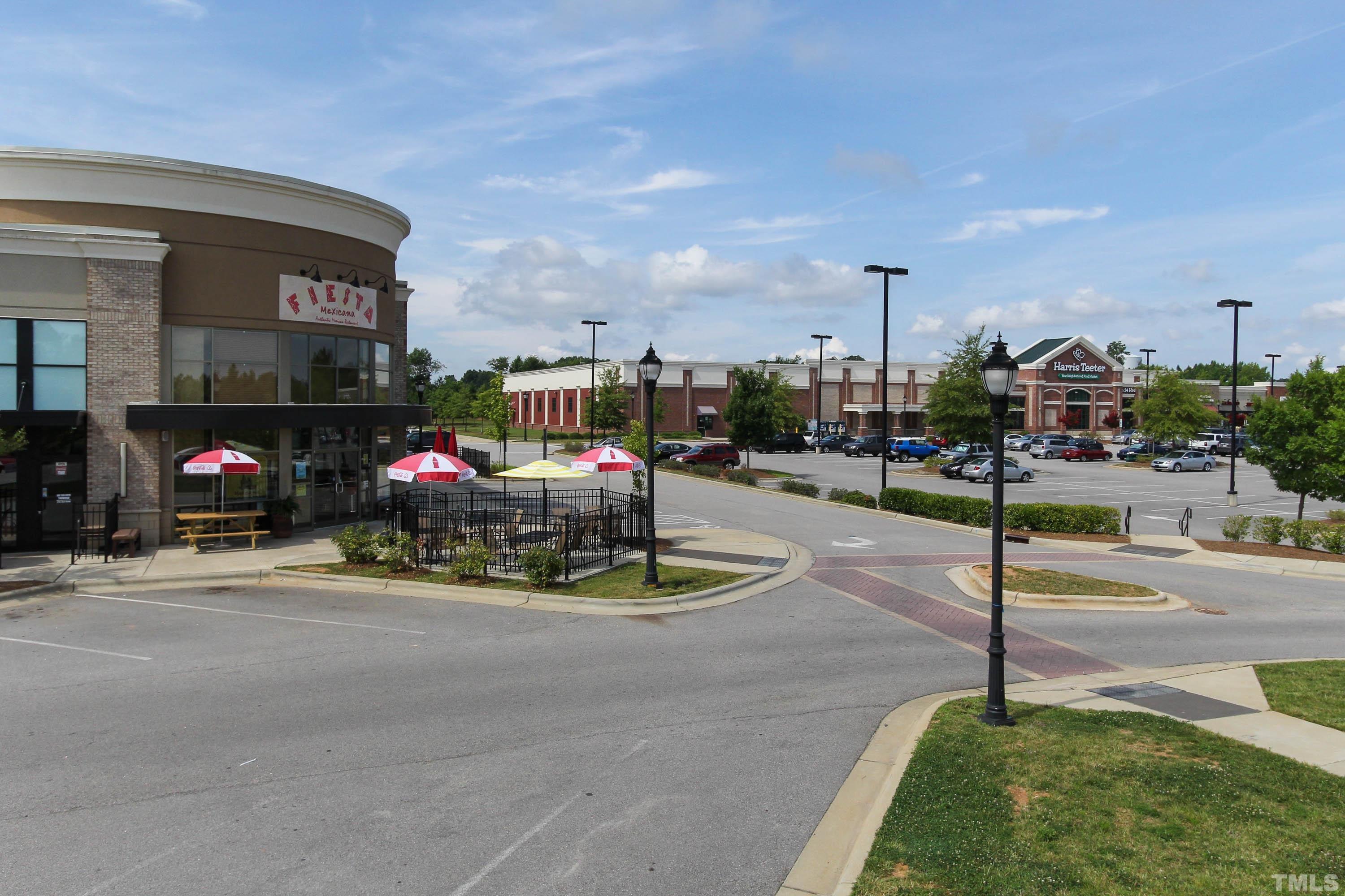 109 Calvander Lane Apex, NC 27539 - Photo 33 of 36 a view of a street with cars