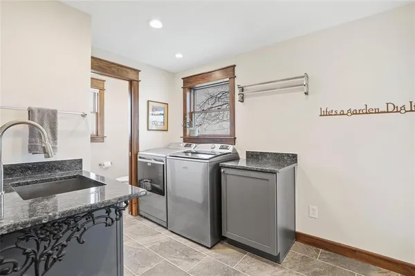 a kitchen with a stove and a sink