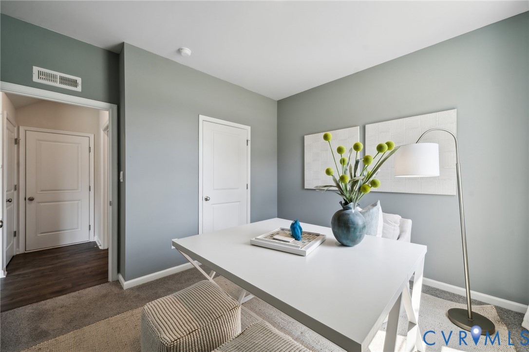 16907 Barmer Road Chesterfield, VA 23832 - Photo 12 of 31 a dining room with furniture and wooden floor