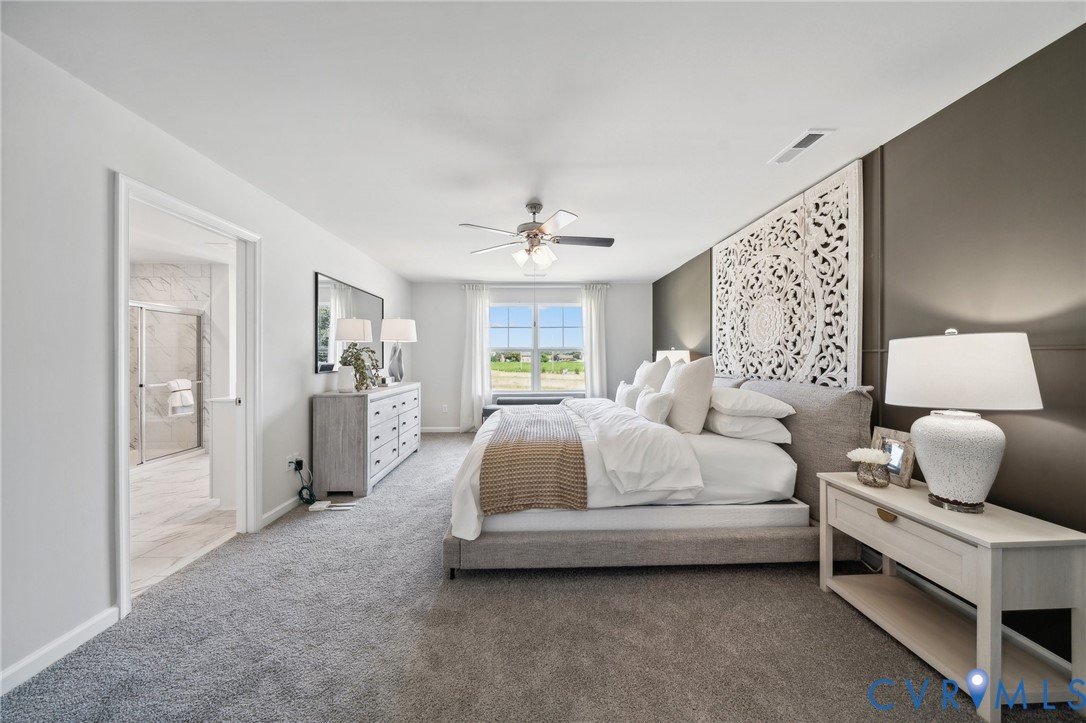 16907 Barmer Road Chesterfield, VA 23832 - Photo 16 of 31 a spacious bedroom with a bed and ceiling fan