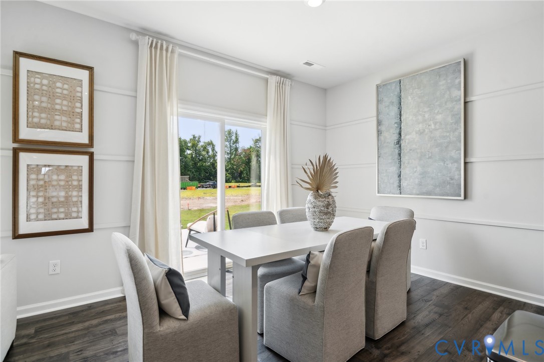 16907 Barmer Road Chesterfield, VA 23832 - Photo 7 of 31 a view of a dining room with furniture window and wooden floor