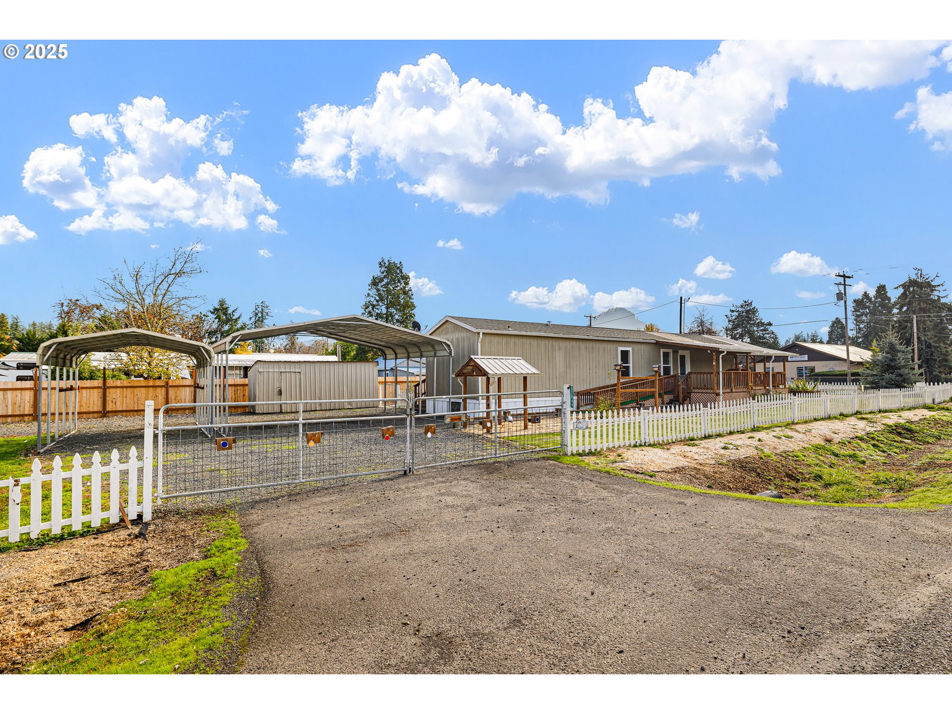 a view of multiple houses with a yard