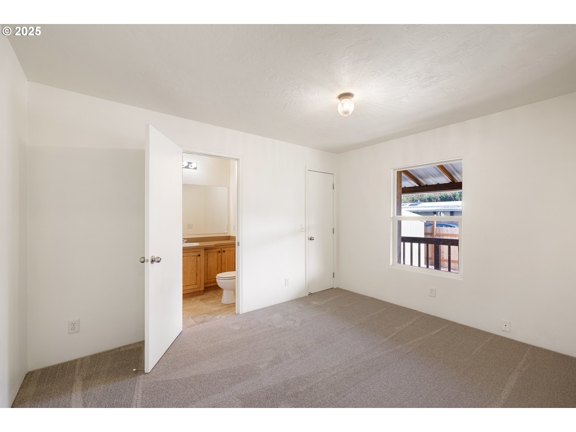 82849 Minnick Road Dexter, OR 97431 - Photo 11 of 41 a view of an empty room and window