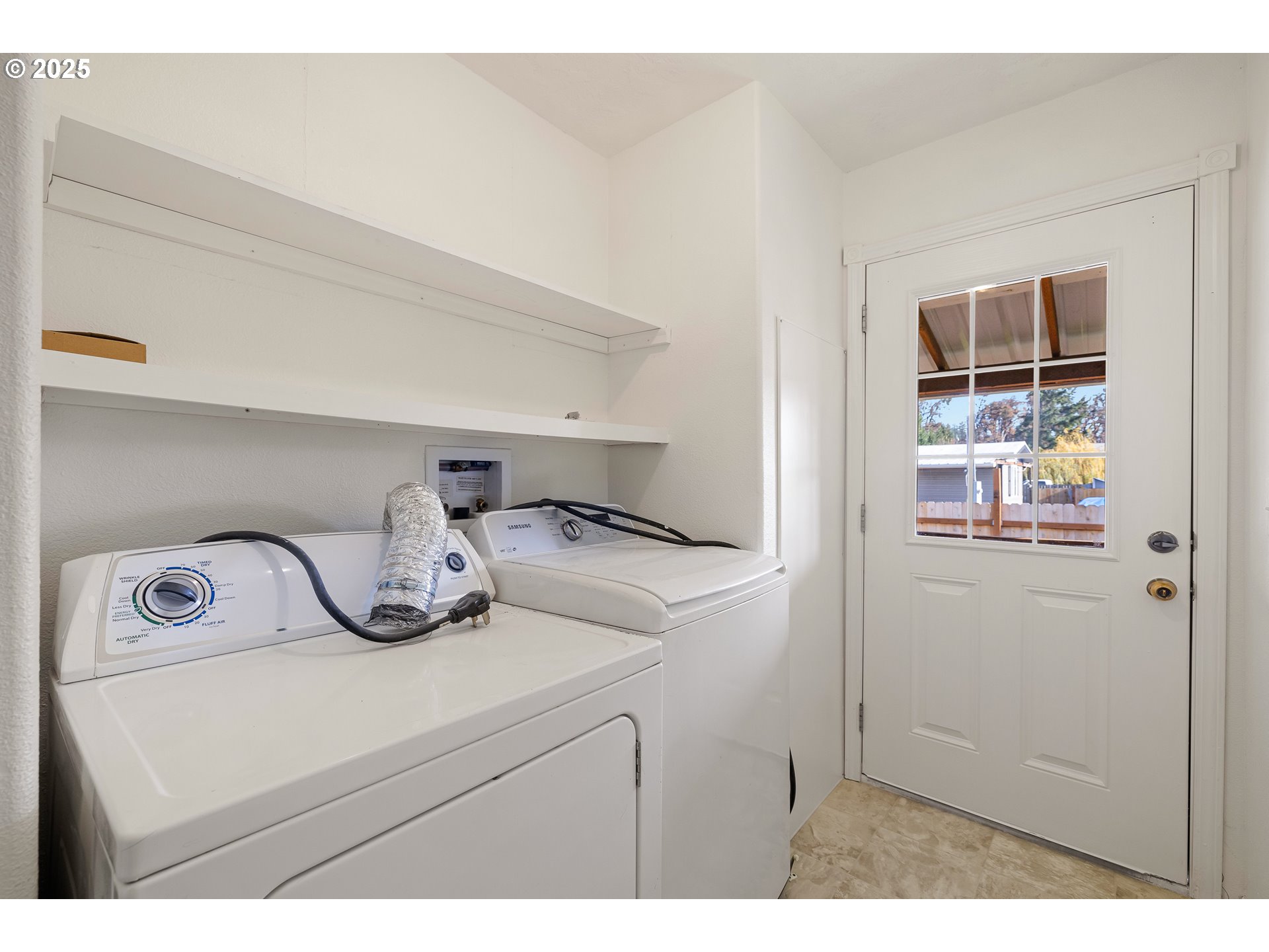 82849 Minnick Road Dexter, OR 97431 - Photo 23 of 41 a utility room with dryer and washer