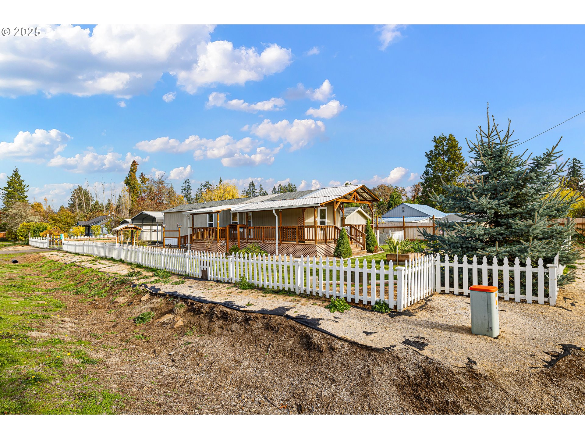 82849 Minnick Road Dexter, OR 97431 - Photo 3 of 41 a view of a house with a yard