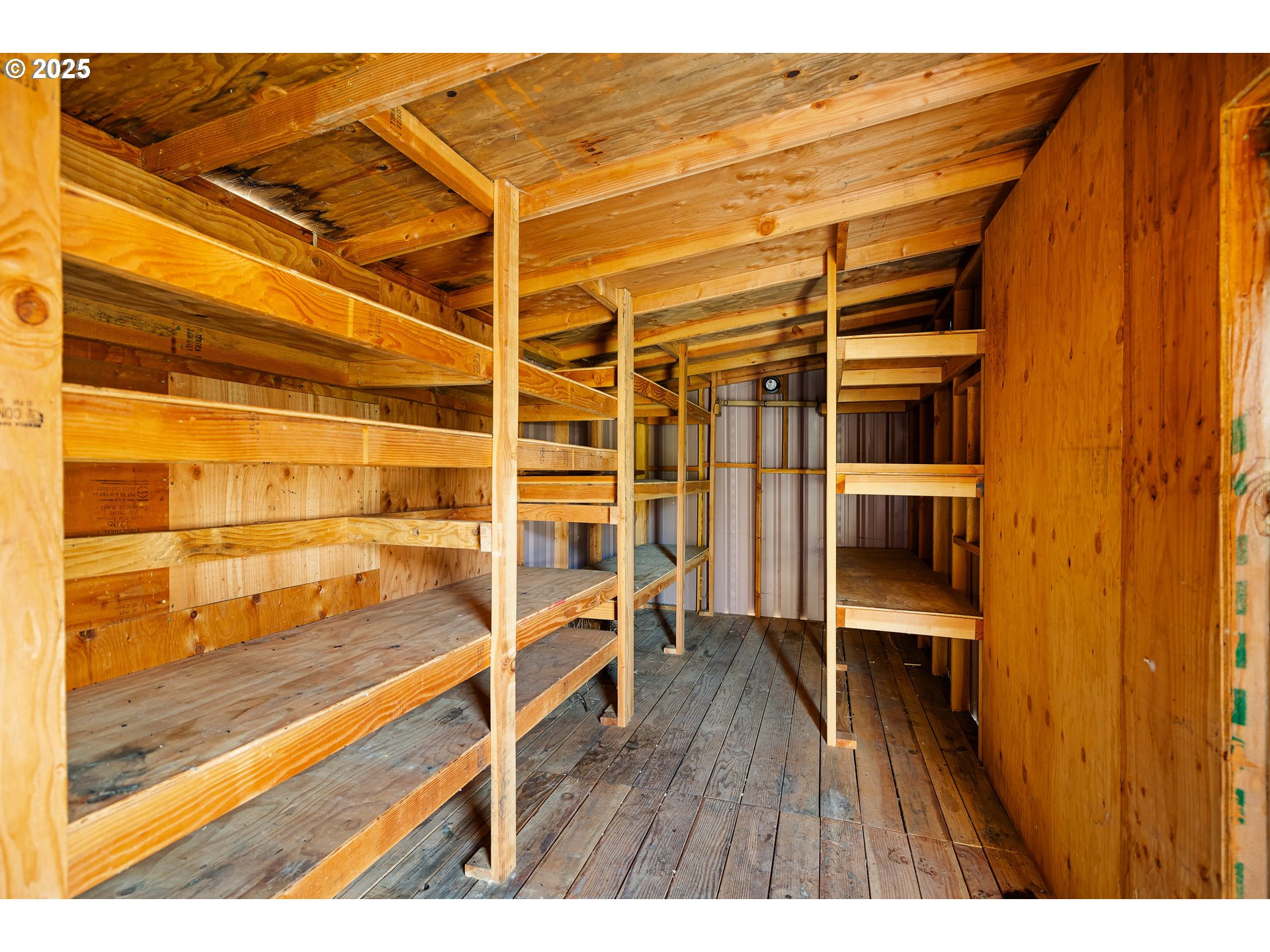 82849 Minnick Road Dexter, OR 97431 - Photo 36 of 41 a view of walk in closet with empty racks