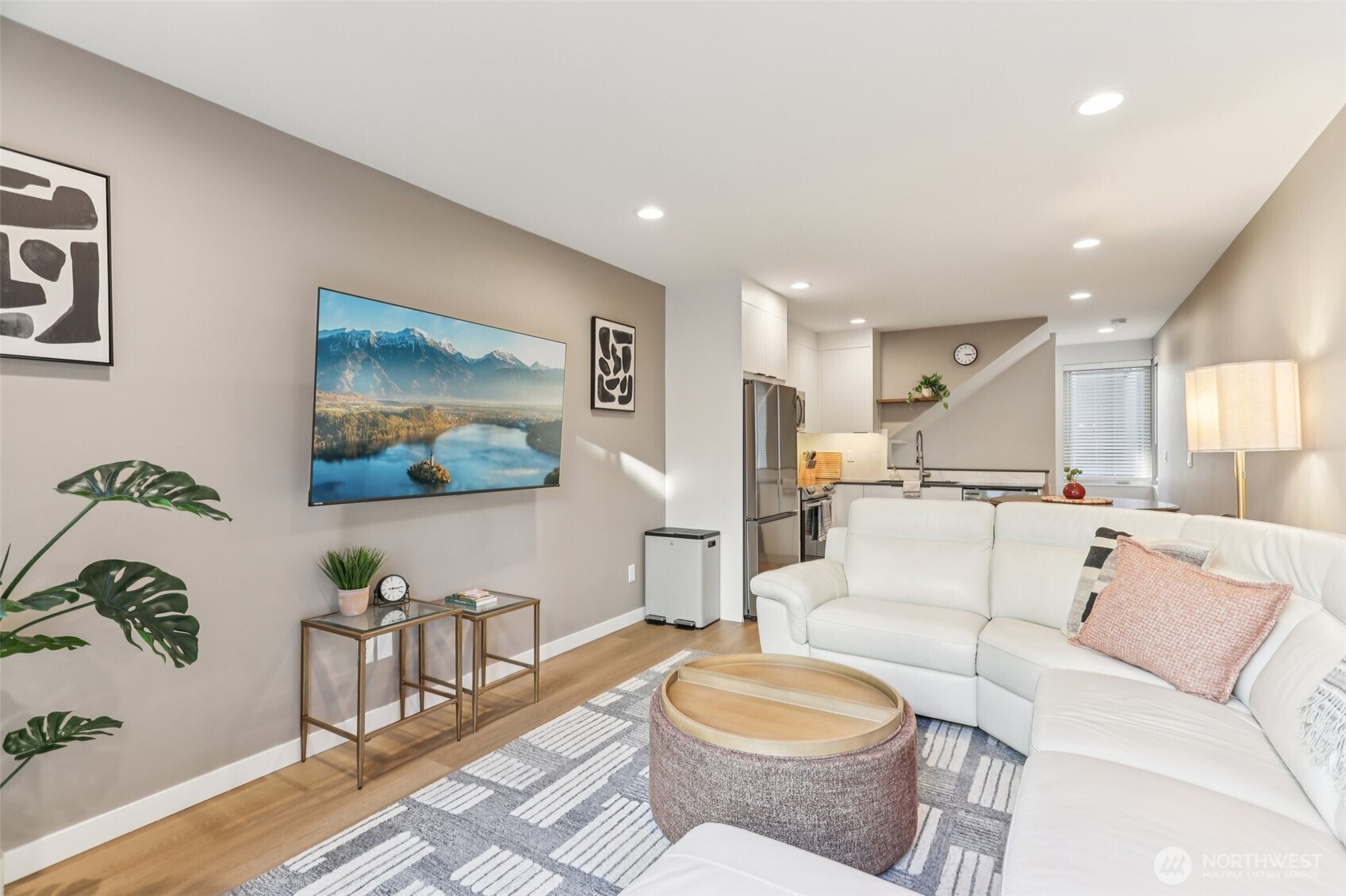 7514 43rd Avenue South, Unit B Seattle, WA 98118 - Photo 12 of 40 a living room with furniture and a view of kitchen