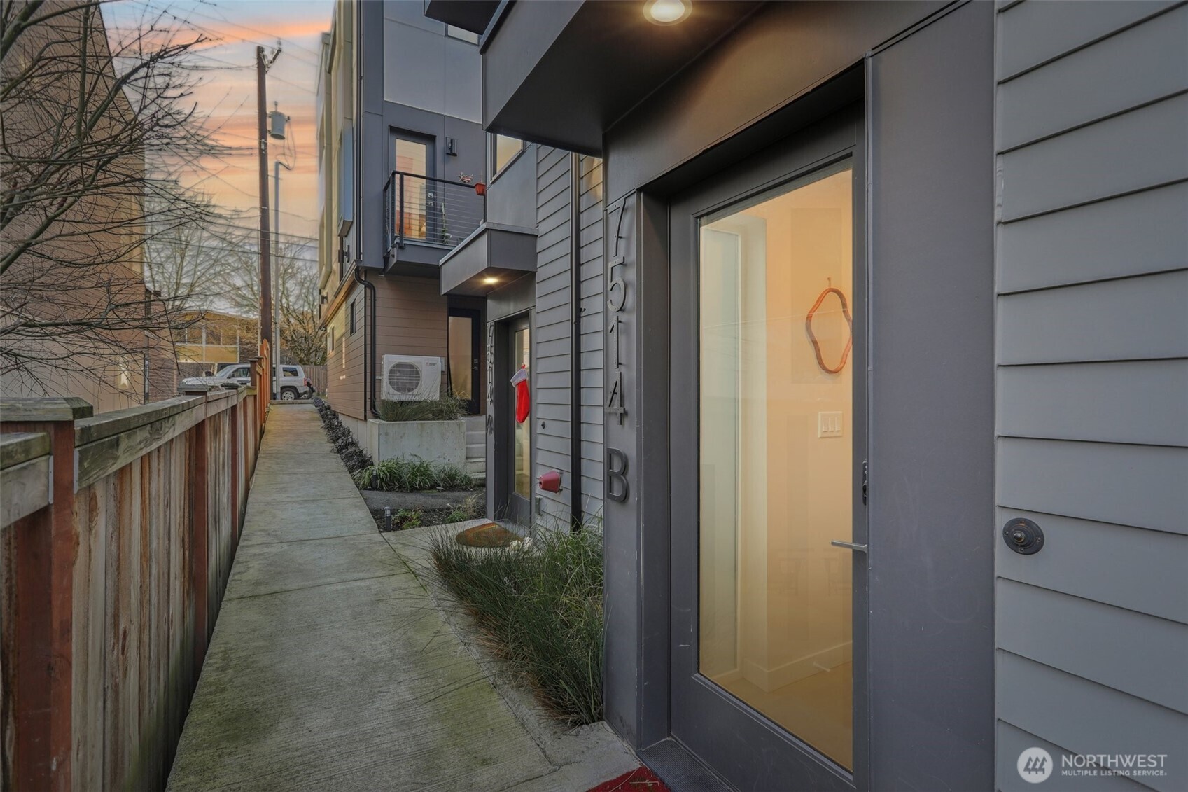 7514 43rd Avenue South, Unit B Seattle, WA 98118 - Photo 2 of 40 a view of a pathway of a house