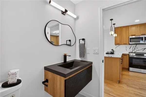 a bathroom with a toilet and a sink