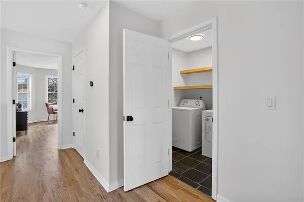 a utility room with dryer and washer
