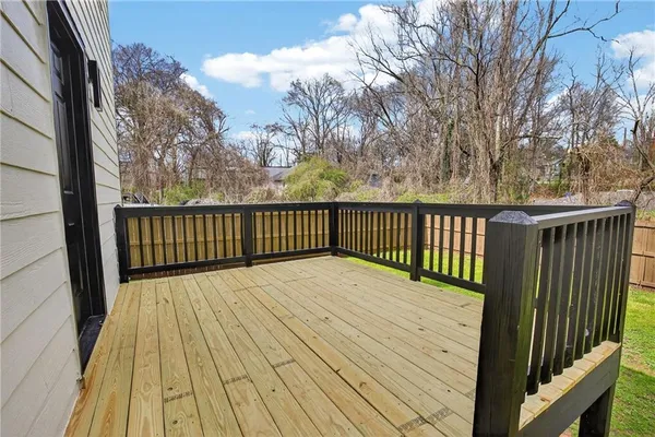 a backyard of a house with barbeque oven