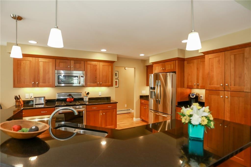 43 Shadagee Road, Unit 14 Saco, ME 04072 - Photo 8 of 21 Kitchen with granite counters, oak...