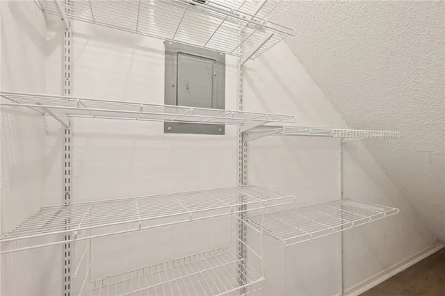 a view of a room with racks on the wall