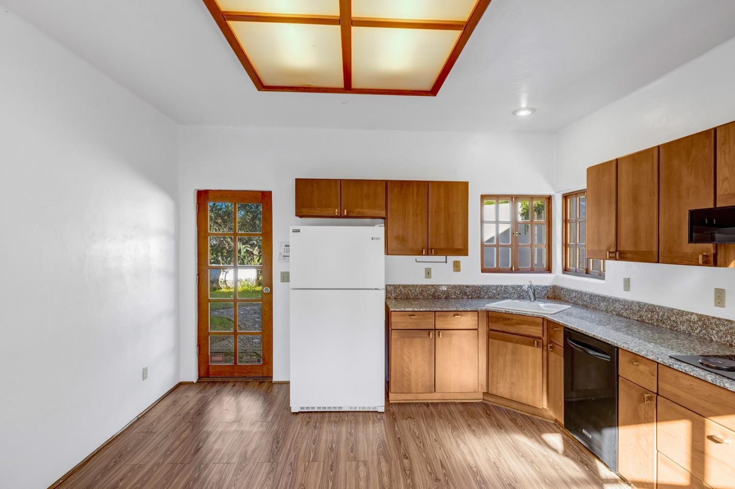 90 Harper Canyon Road Salinas, CA 93908 - Photo 24 of 47 a kitchen with a refrigerator and a sink