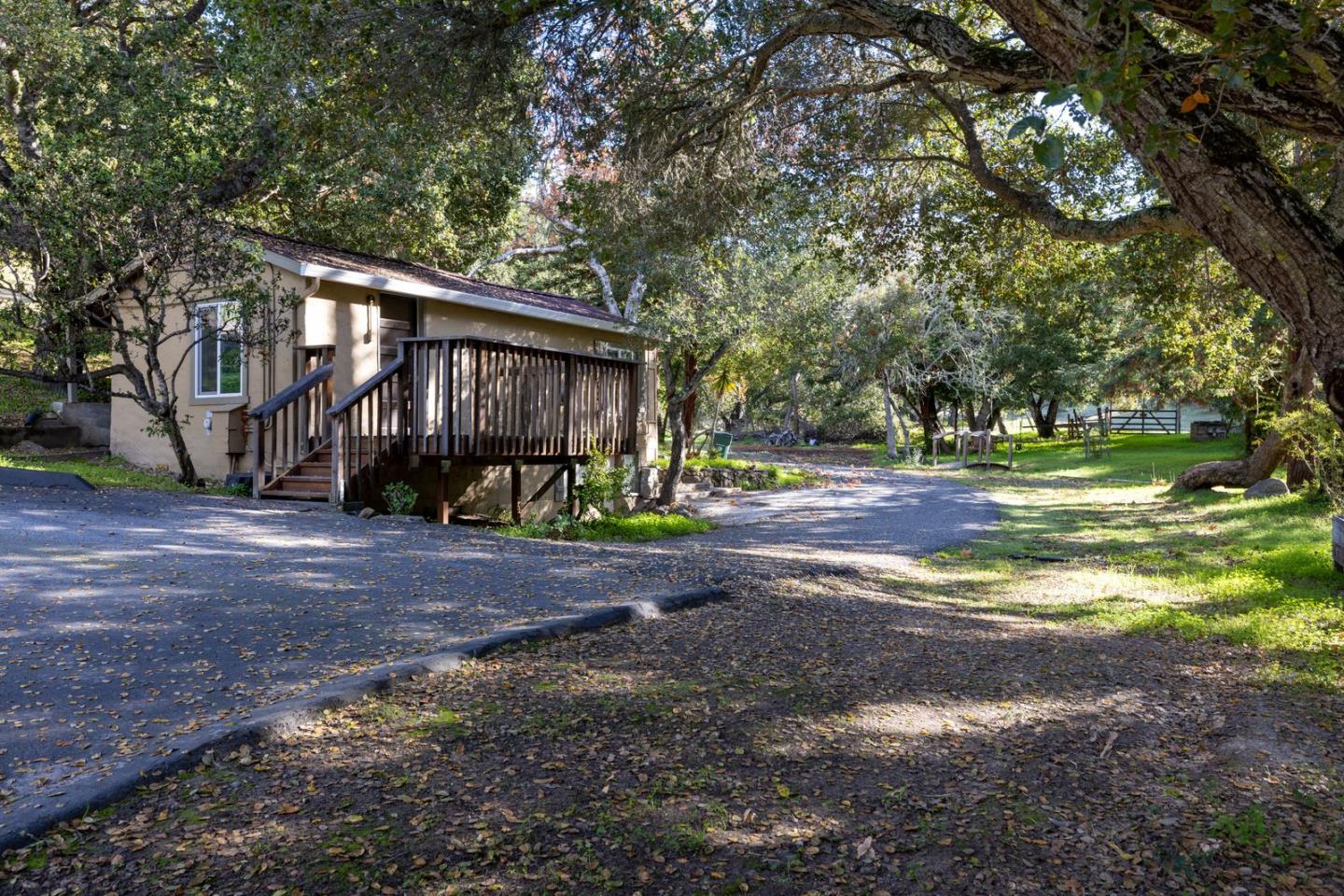 90 Harper Canyon Road Salinas, CA 93908 - Photo 37 of 47 a view of a backyard with large trees