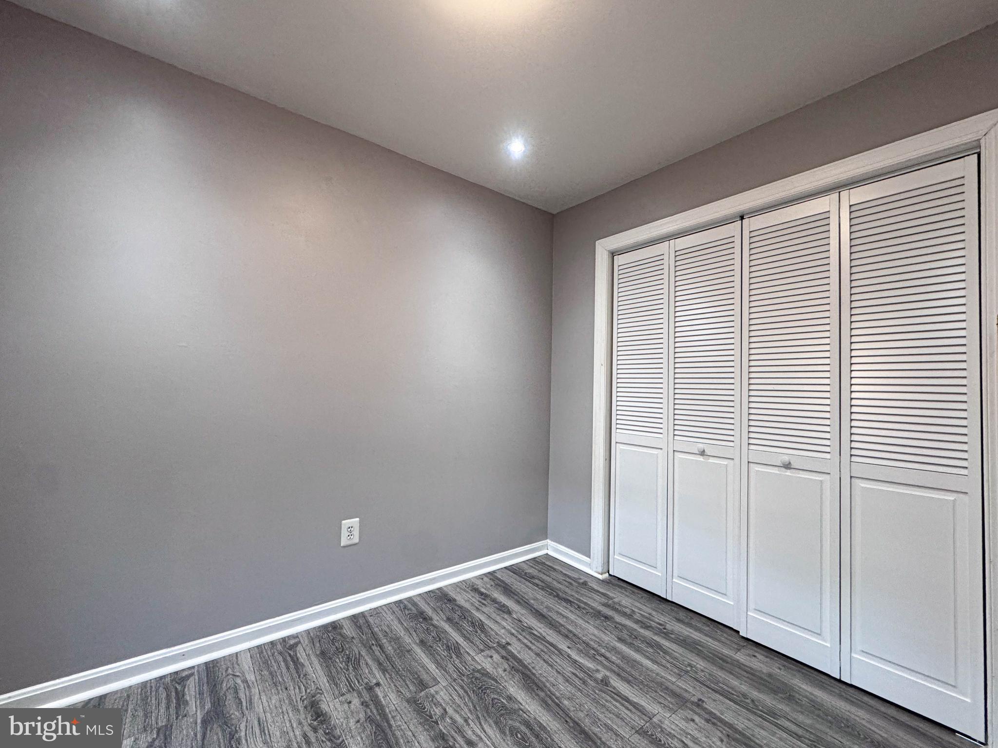 68 Millhaven Court Edgewater, MD 21037 - Photo 12 of 31 an empty room with wooden floor