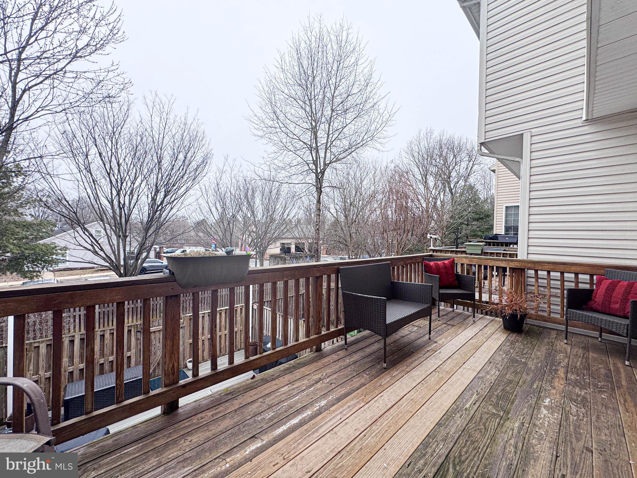 68 Millhaven Court Edgewater, MD 21037 - Photo 21 of 31 a view of a wooden deck with furniture