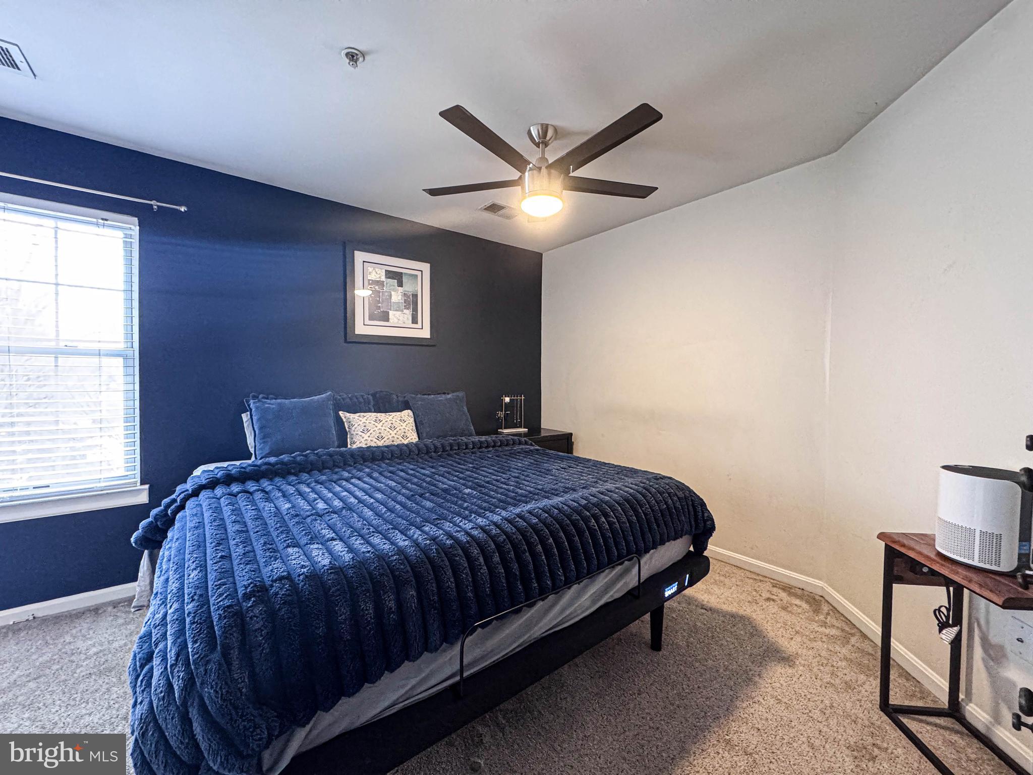 68 Millhaven Court Edgewater, MD 21037 - Photo 26 of 31 a bedroom with a bed and window