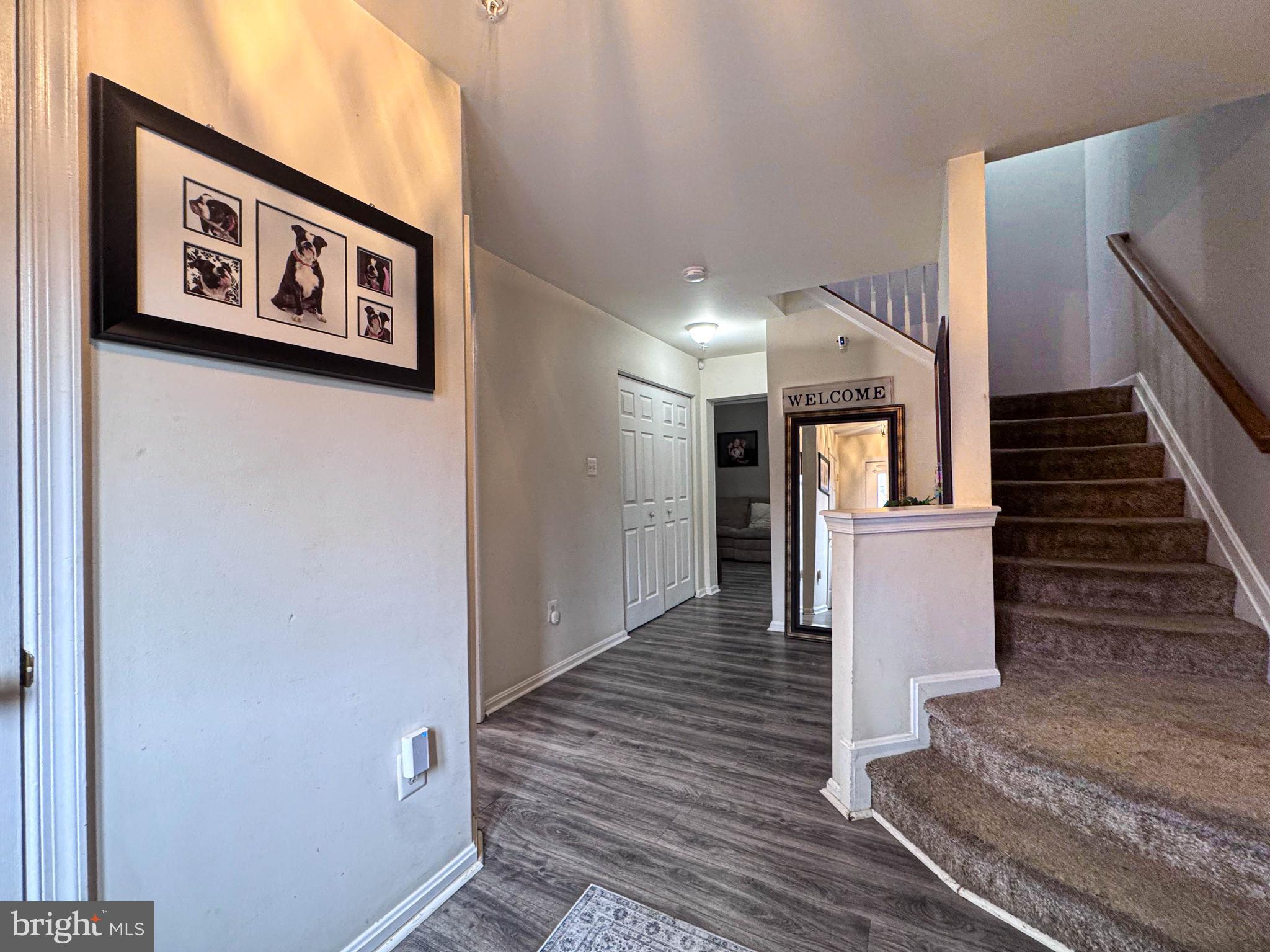 68 Millhaven Court Edgewater, MD 21037 - Photo 8 of 31 a view of a hallway with wooden floor and stairs