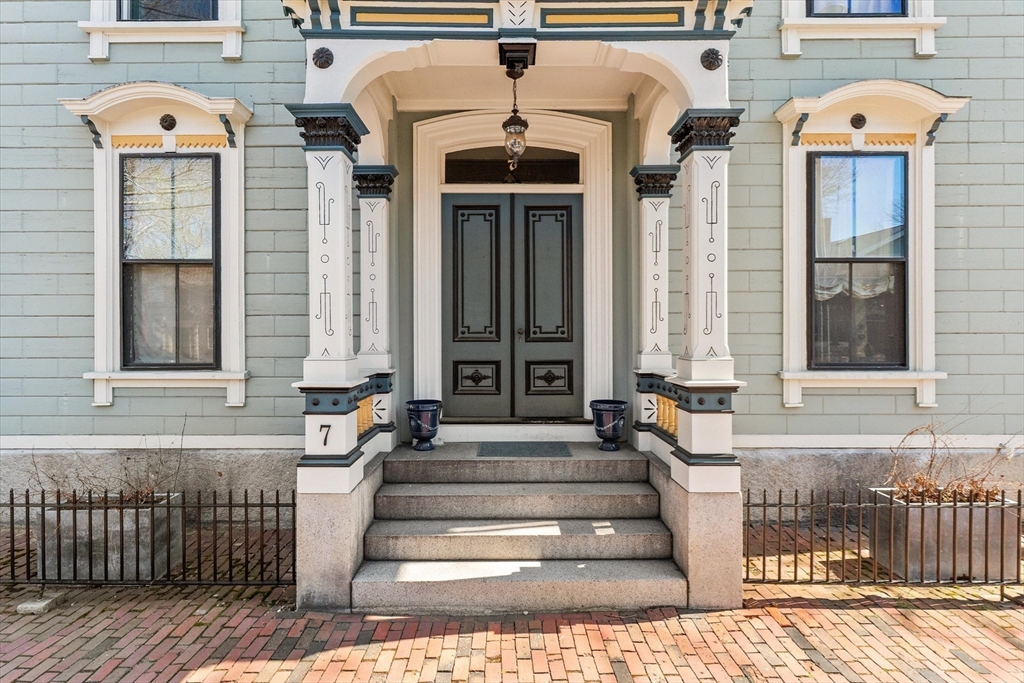 7 Winter Street, Unit 2 Salem, MA 01970 - Photo 2 of 42 a front view of a house with a porch