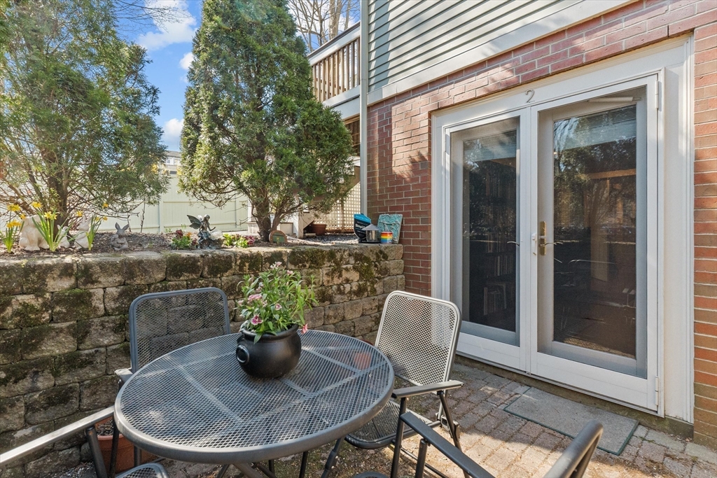7 Winter Street, Unit 2 Salem, MA 01970 - Photo 29 of 42 a view of a dining room with furniture and front door