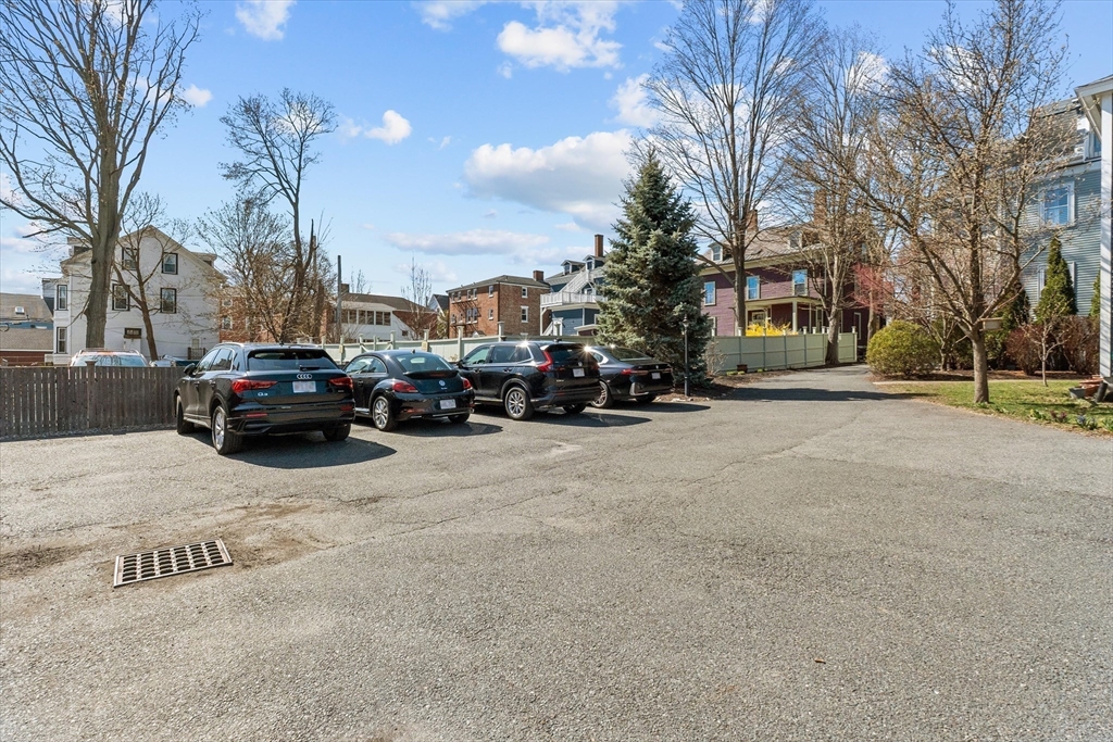 7 Winter Street, Unit 2 Salem, MA 01970 - Photo 33 of 42 a cars parked on the side of a street