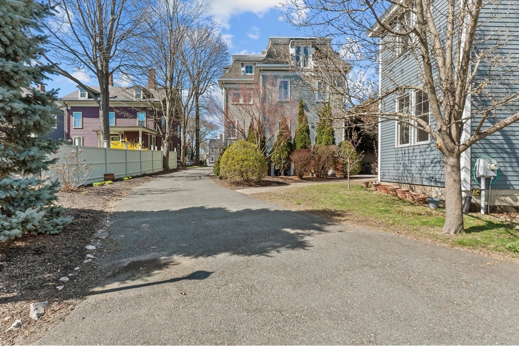 7 Winter Street, Unit 2 Salem, MA 01970 - Photo 34 of 42 a view of a house with a yard