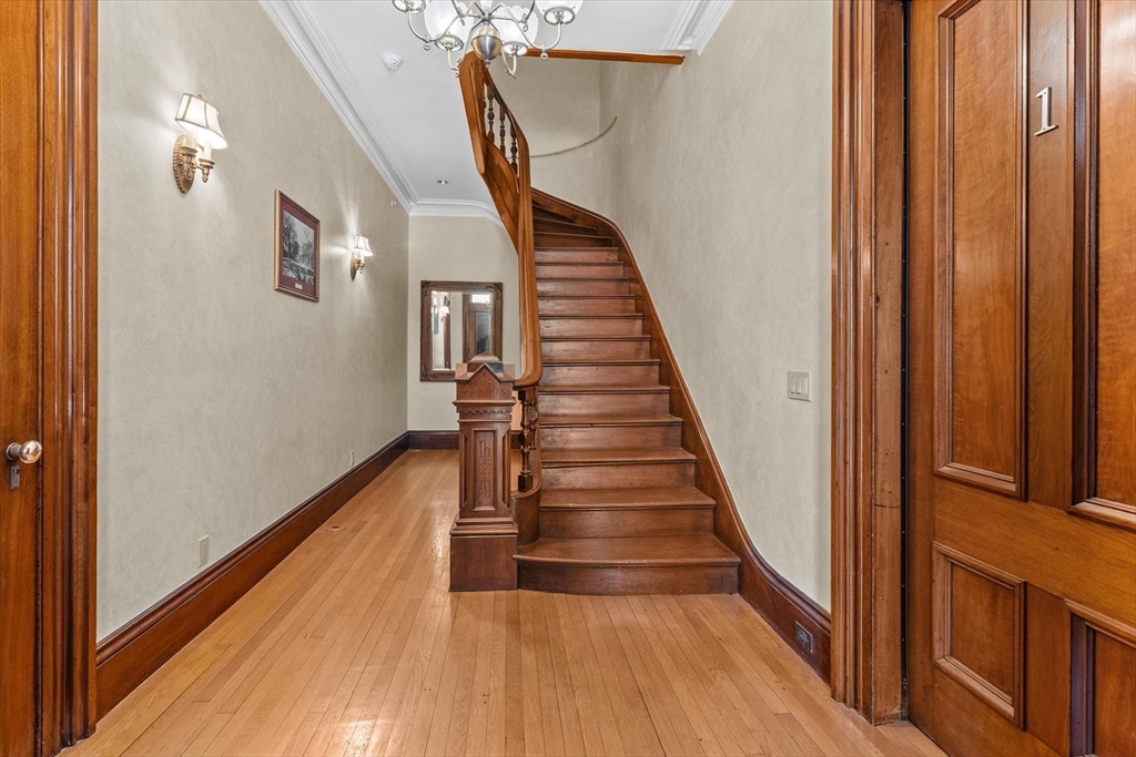 7 Winter Street, Unit 2 Salem, MA 01970 - Photo 35 of 42 a view of entryway and hall with wooden floor