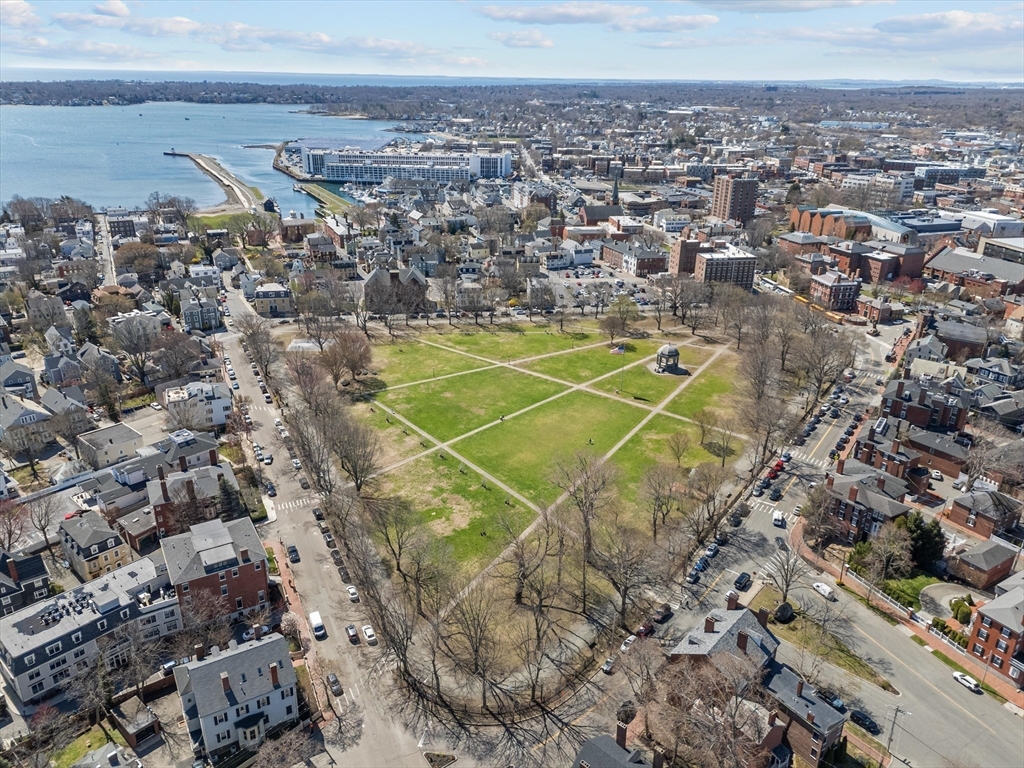 7 Winter Street, Unit 2 Salem, MA 01970 - Photo 38 of 42 an aerial view of a tennis ground with a large trees