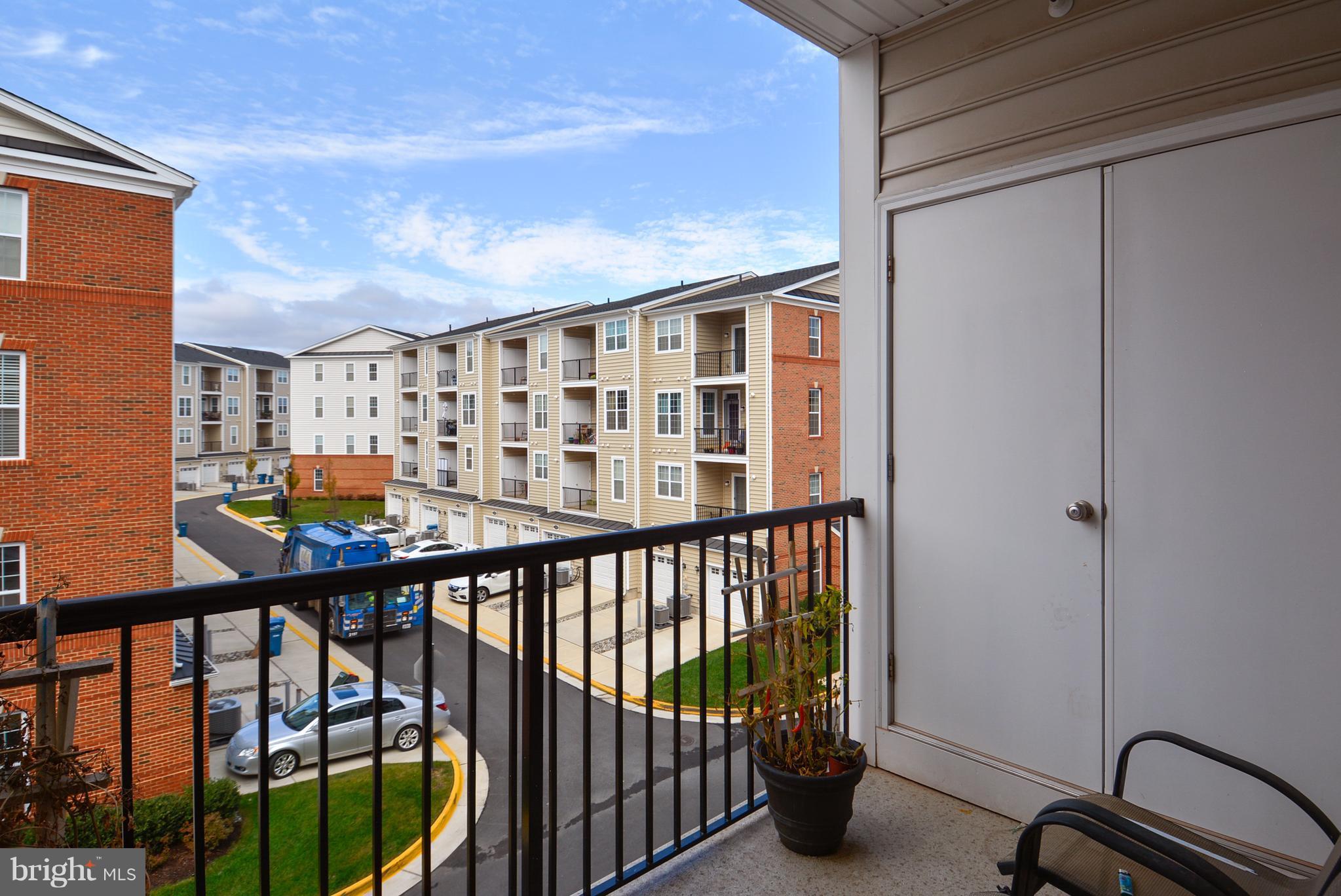 23487 Logans Ridge Terrace Ashburn, VA 20148 - Photo 6 of 27 Balcony off Kitchen and Master Bedroom
