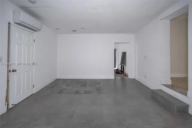 a view of a livingroom and a street