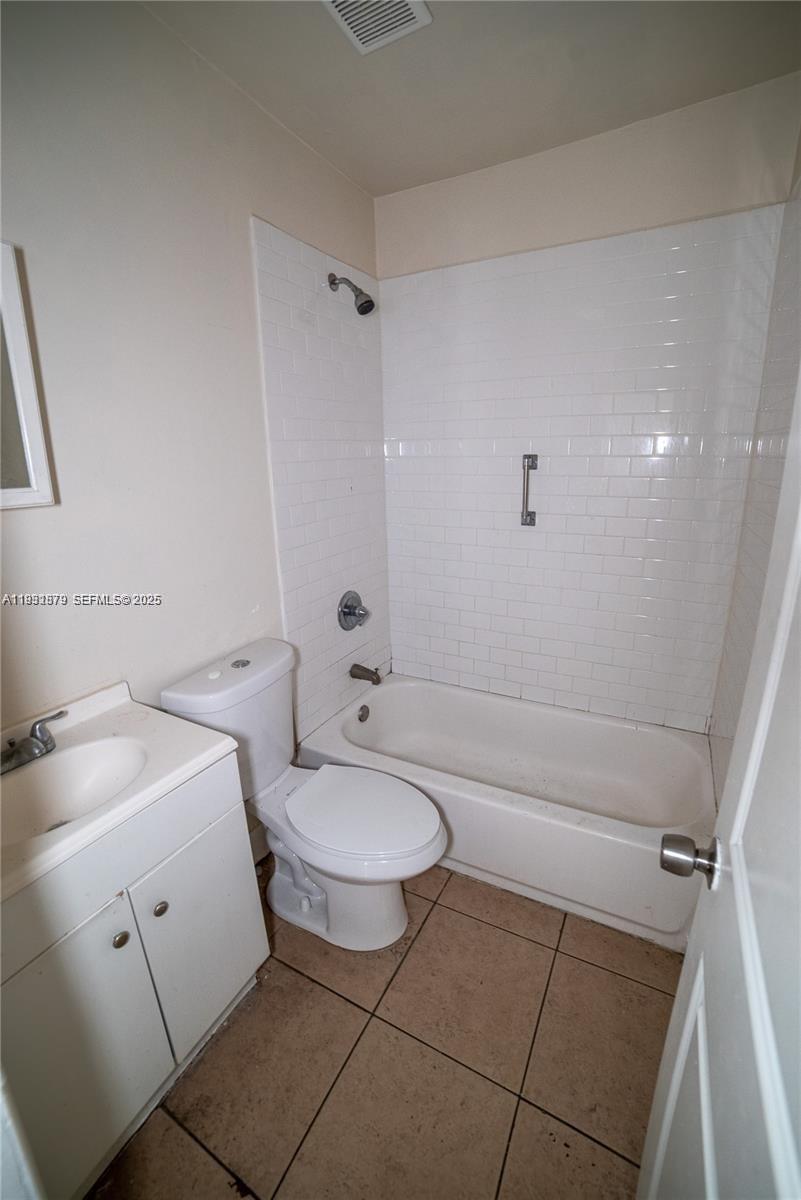 2501 Northwest 22nd Avenue Miami, FL 33142 - Photo 27 of 43 a bathroom with a sink toilet and shower
