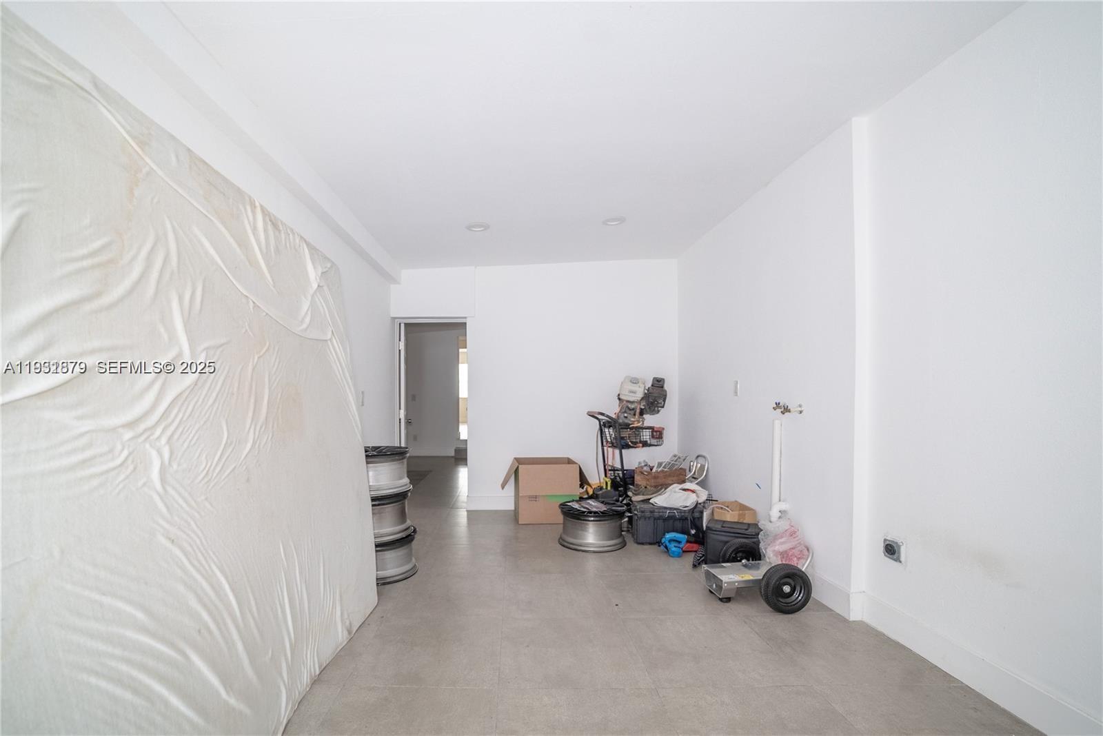 2501 Northwest 22nd Avenue Miami, FL 33142 - Photo 29 of 43 a living room with furniture and a couch