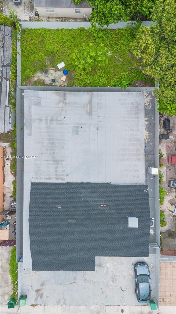2501 Northwest 22nd Avenue Miami, FL 33142 - Photo 8 of 43 an aerial view of a houses with outdoor space