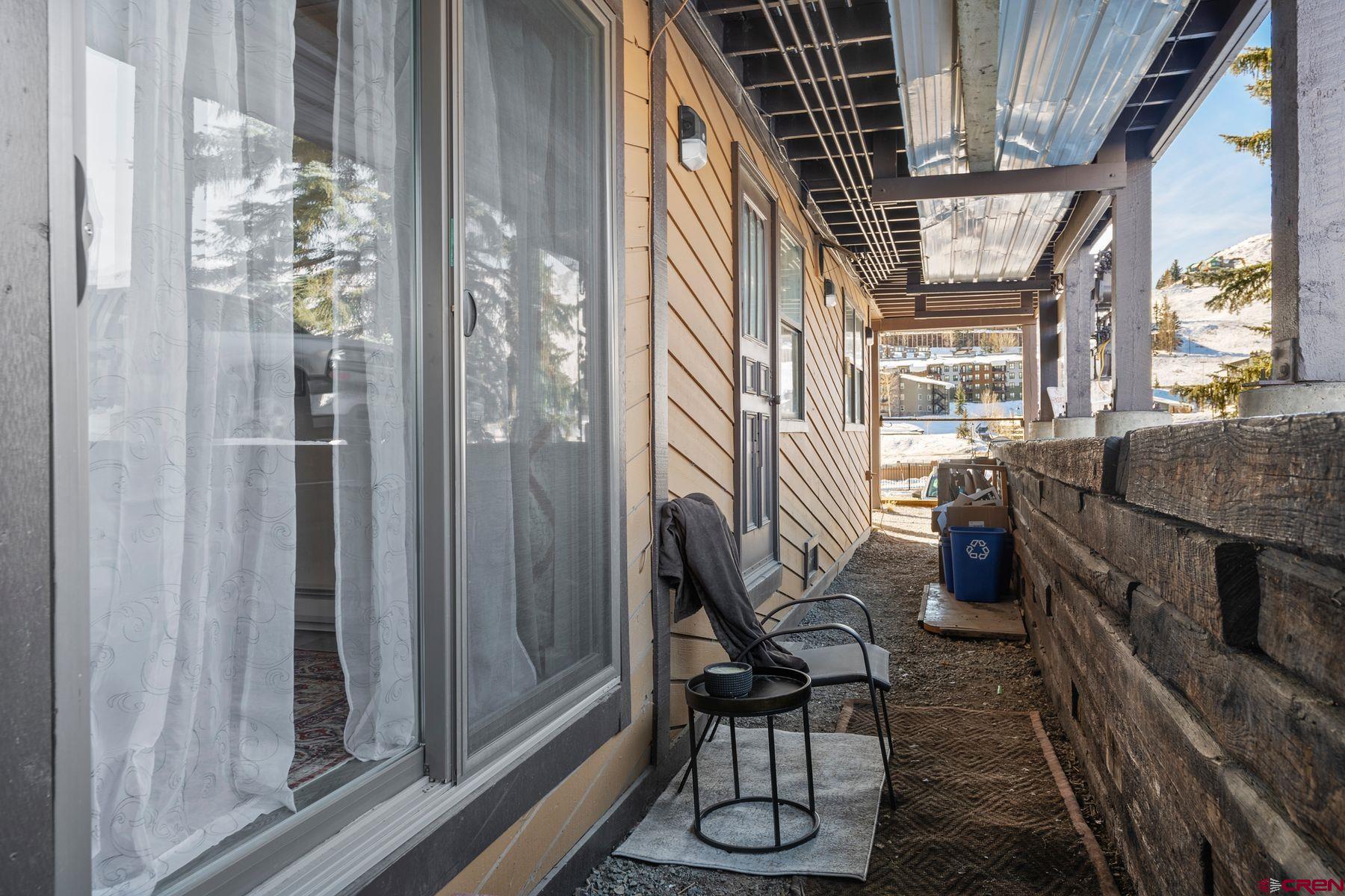 35 Emmons Road, Unit A Crested Butte, CO 81225 - Photo 19 of 28 The outdoor sitting area off the kitchen and living room is a bonus.