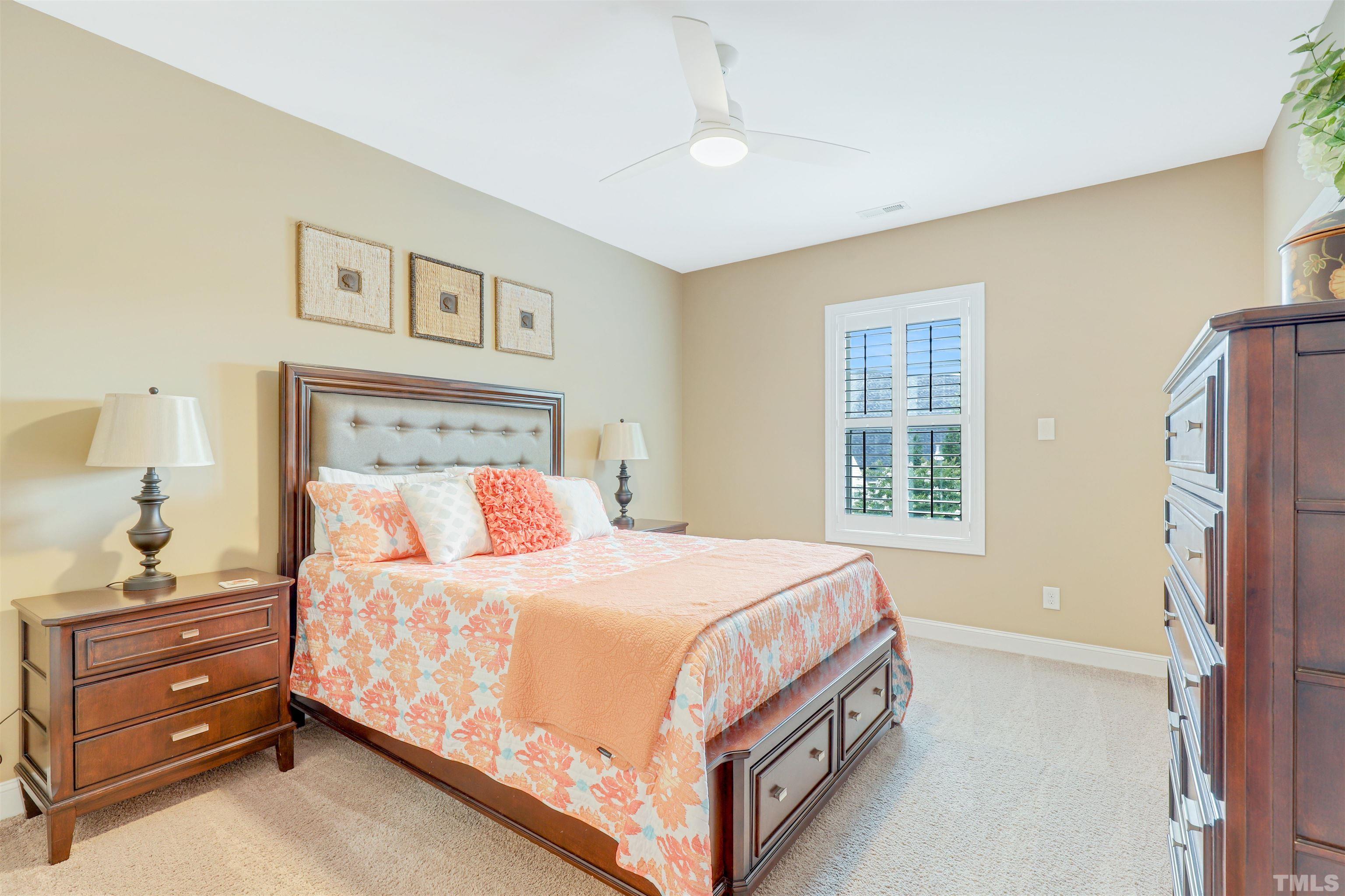 4312 Glengrove Road Raleigh, NC 27616 - Photo 17 of 50 a bedroom with a bed and a window dresser